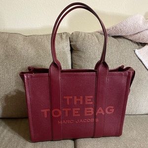 The Marc Jacobs large burgundy tote bag